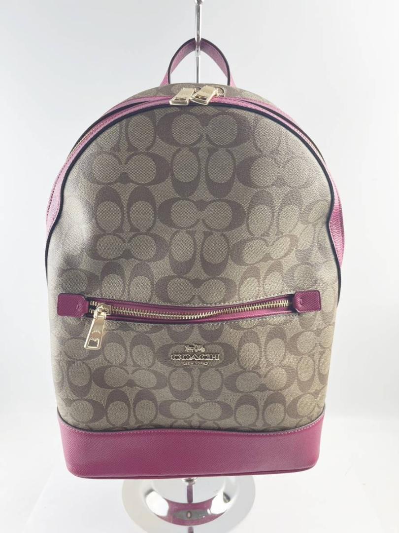 未使用品 美品 コーチ C5679 シグネチャー ケンリー リュックピンク